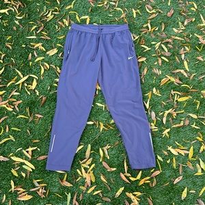 Nike DRI-FIT purple. Likely worn.